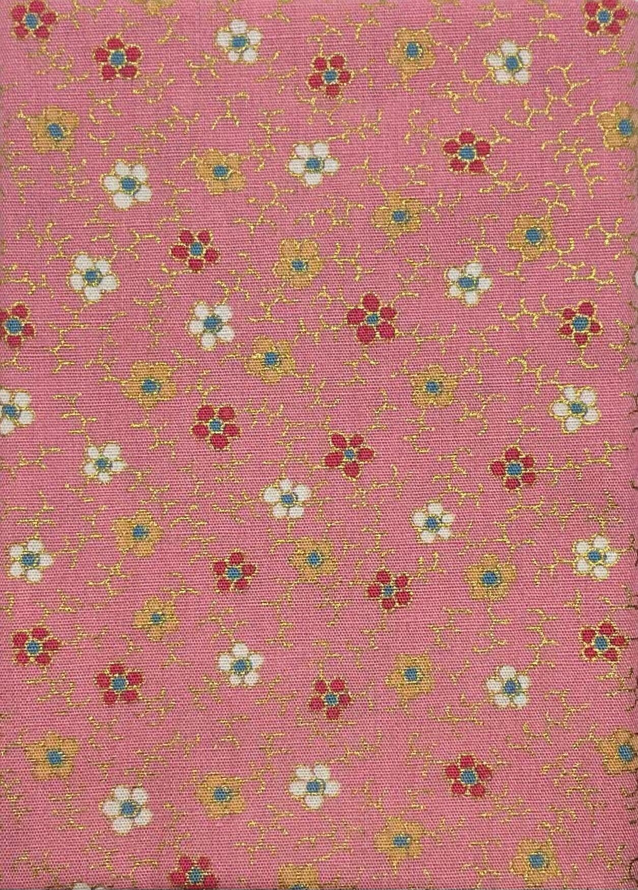 Flower print on a pink cotton with metallic details