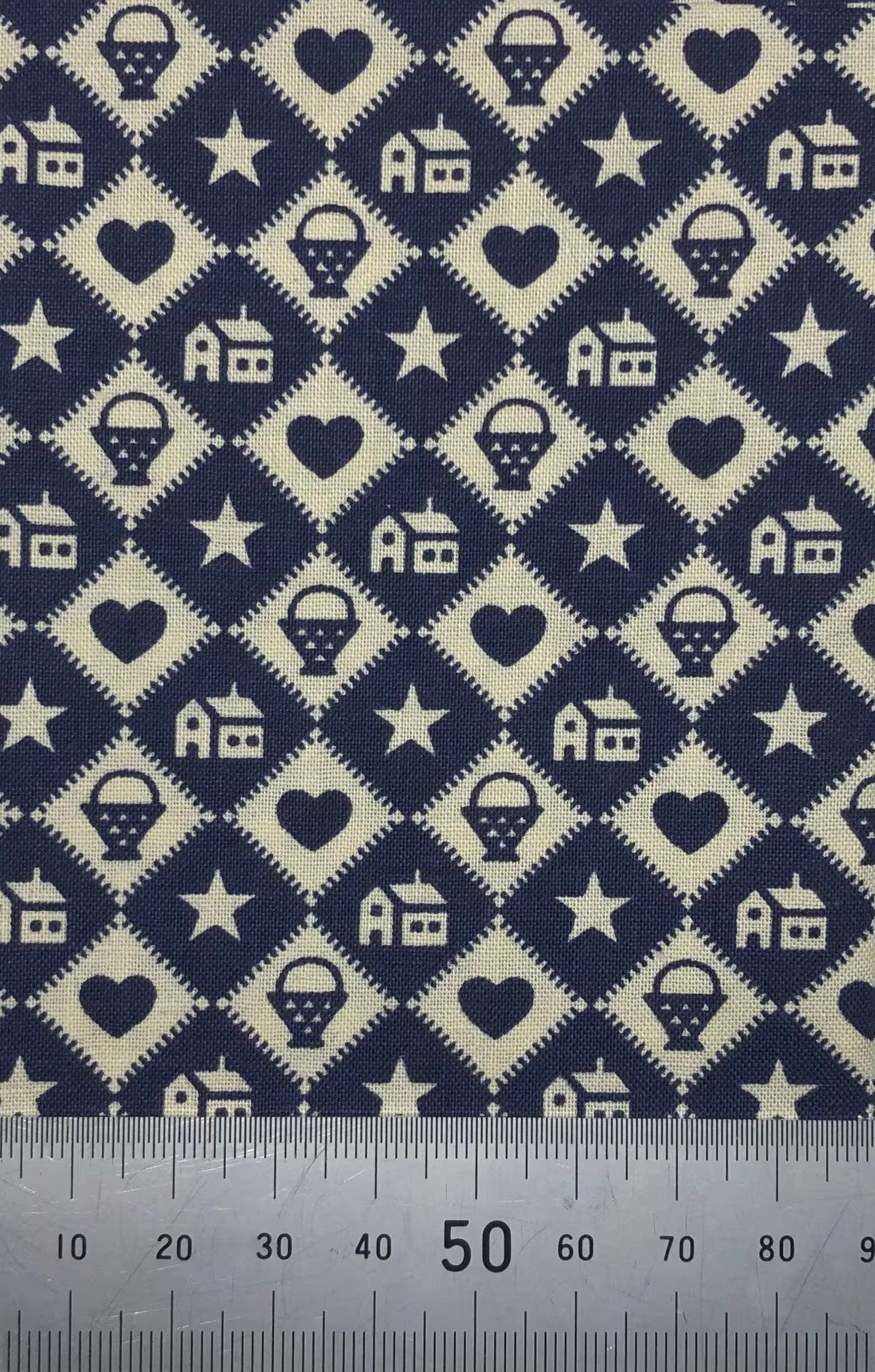 Blue and cream diamonds with symbol pattern (fat quarter)