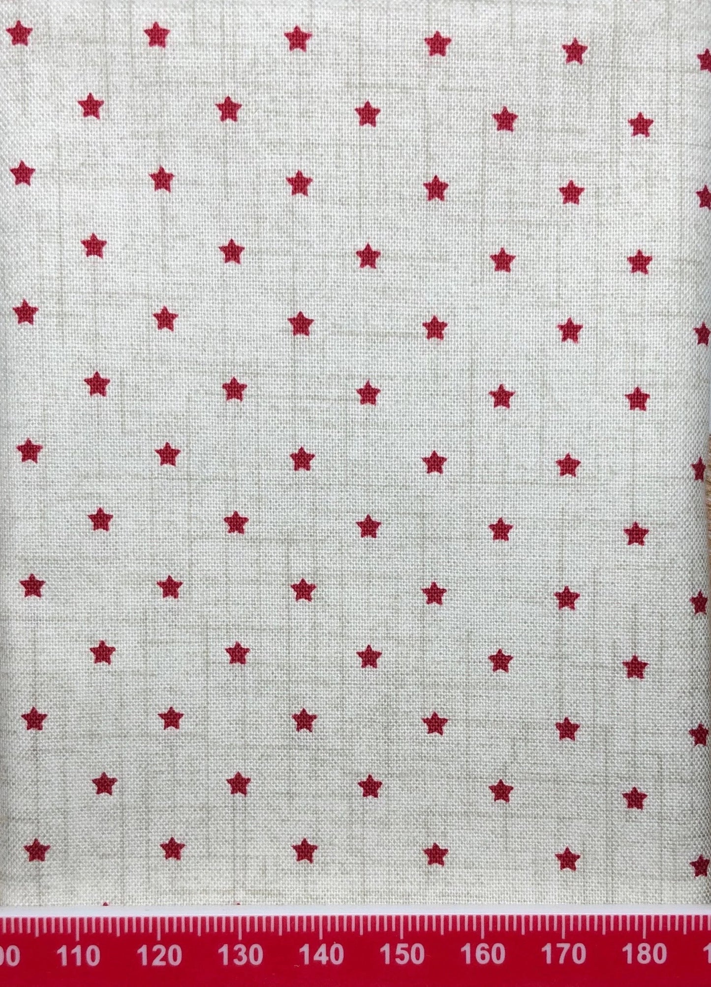 Red stars on grey cotton