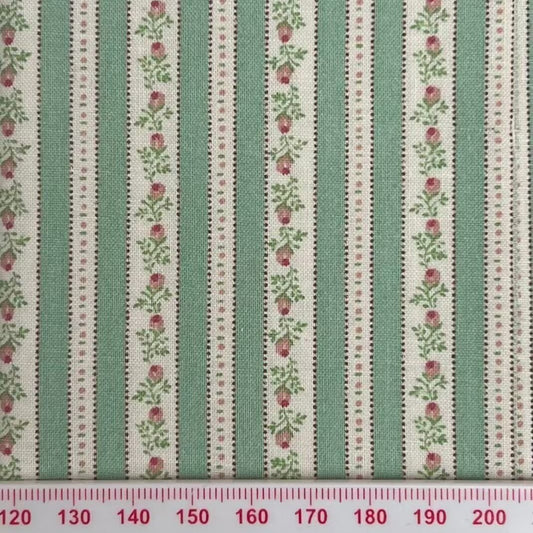 Green and cream stripes with pink flowers running through
