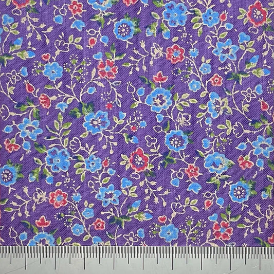 Vibrant blue are red floral print on a purple cotton