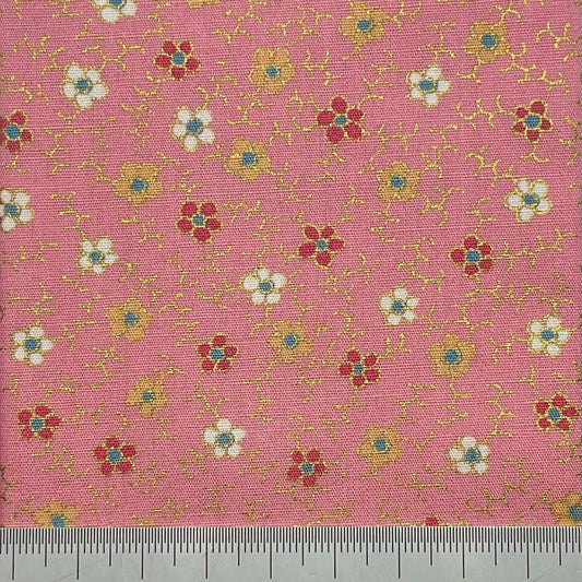 Flower print on a pink cotton with metallic details