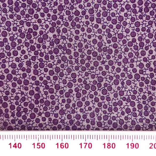 Purple circles on lilac cotton