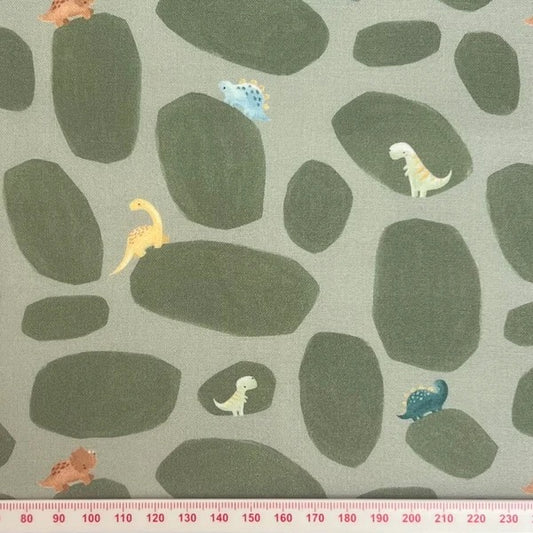 Small dinosaurs on green cotton (Fat quarter)