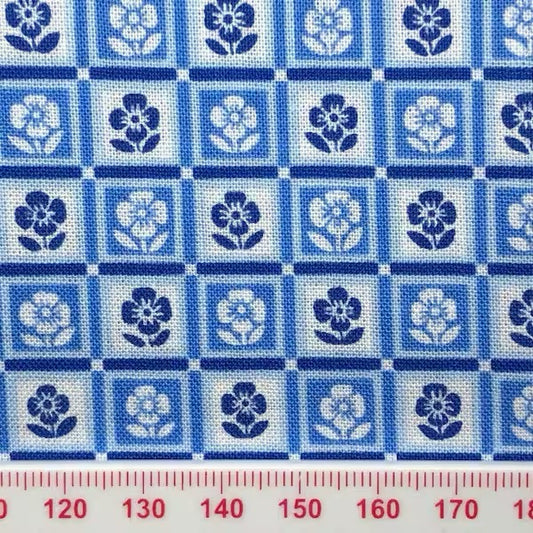 Blue shades, flowers in squares. (fat quarter)