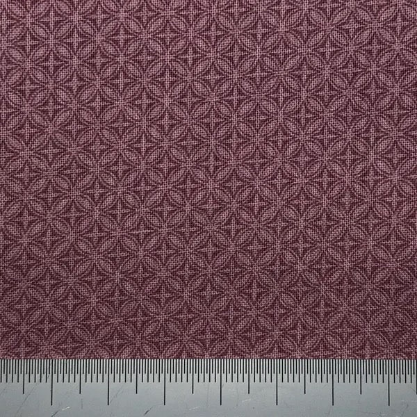Purple circles on a pale purple cotton
