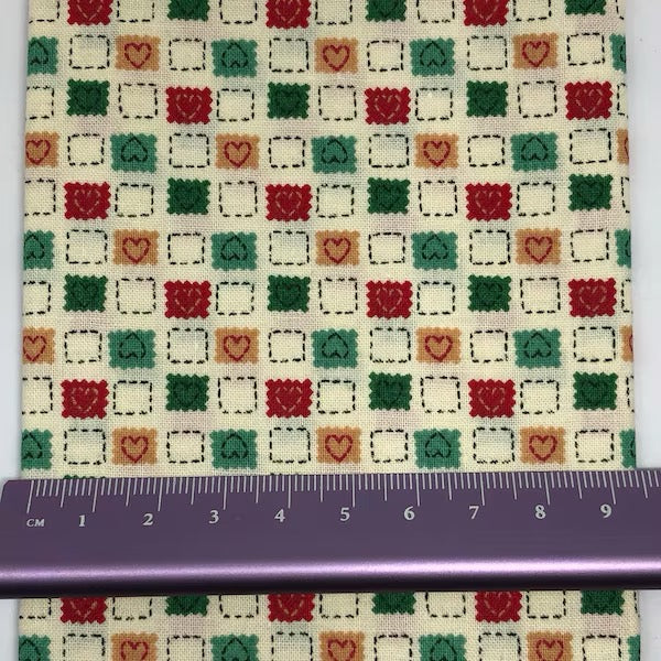 Green, red and yellow squares with heart patchwork cotton print