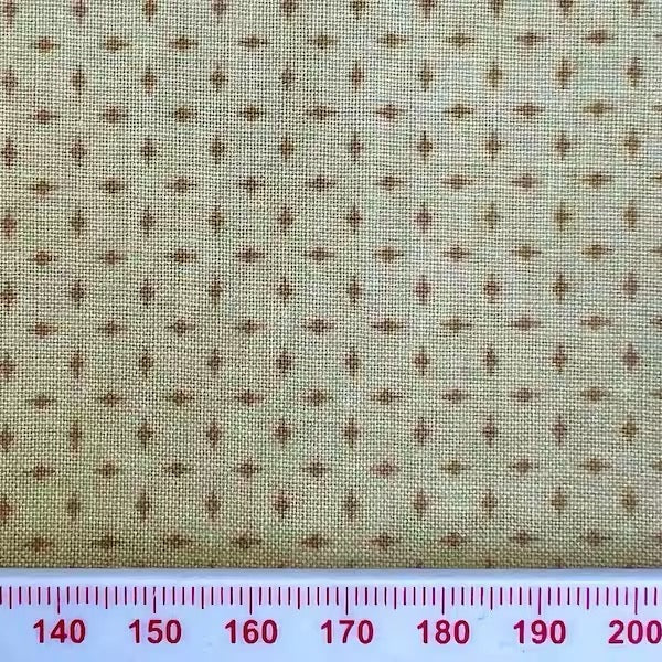 Beige pattern on cream cotton