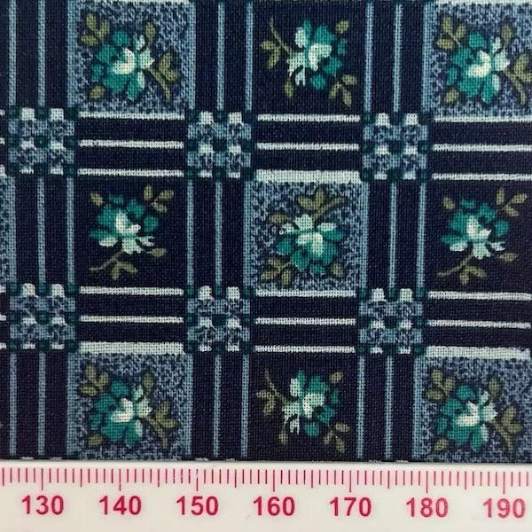 Green flowers in squares on blue shades (fat quarter)
