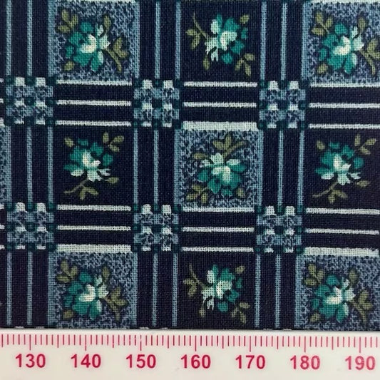 Green flowers in squares on blue shades (fat quarter)