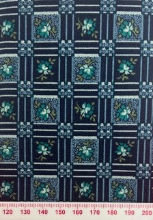 Green flowers in squares on blue shades (fat quarter)