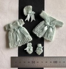 Knitting Pattern. Toddlers or small girls lacy patterned dress with short sleeves, long sleeved coat, bonnet and socks. 1:12th scale dolls