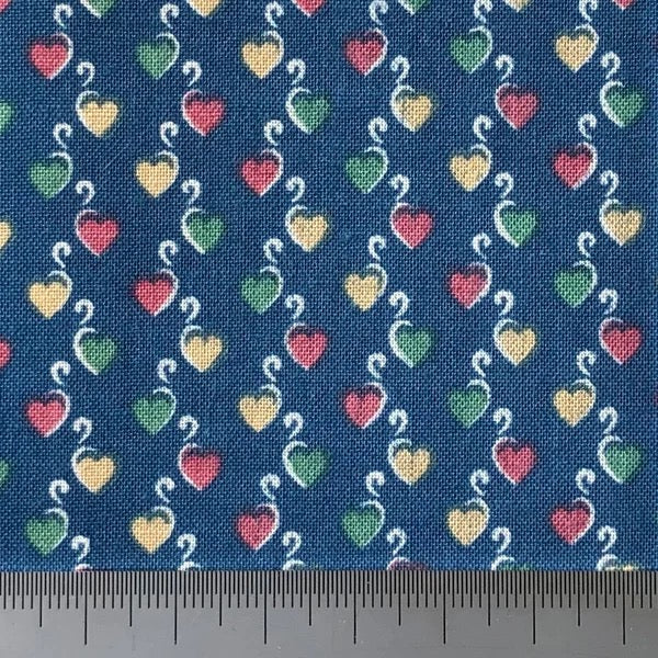 Mixed hearts on a blue cotton