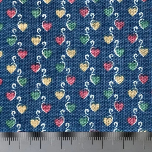 Mixed hearts on a blue cotton (fat quarter)