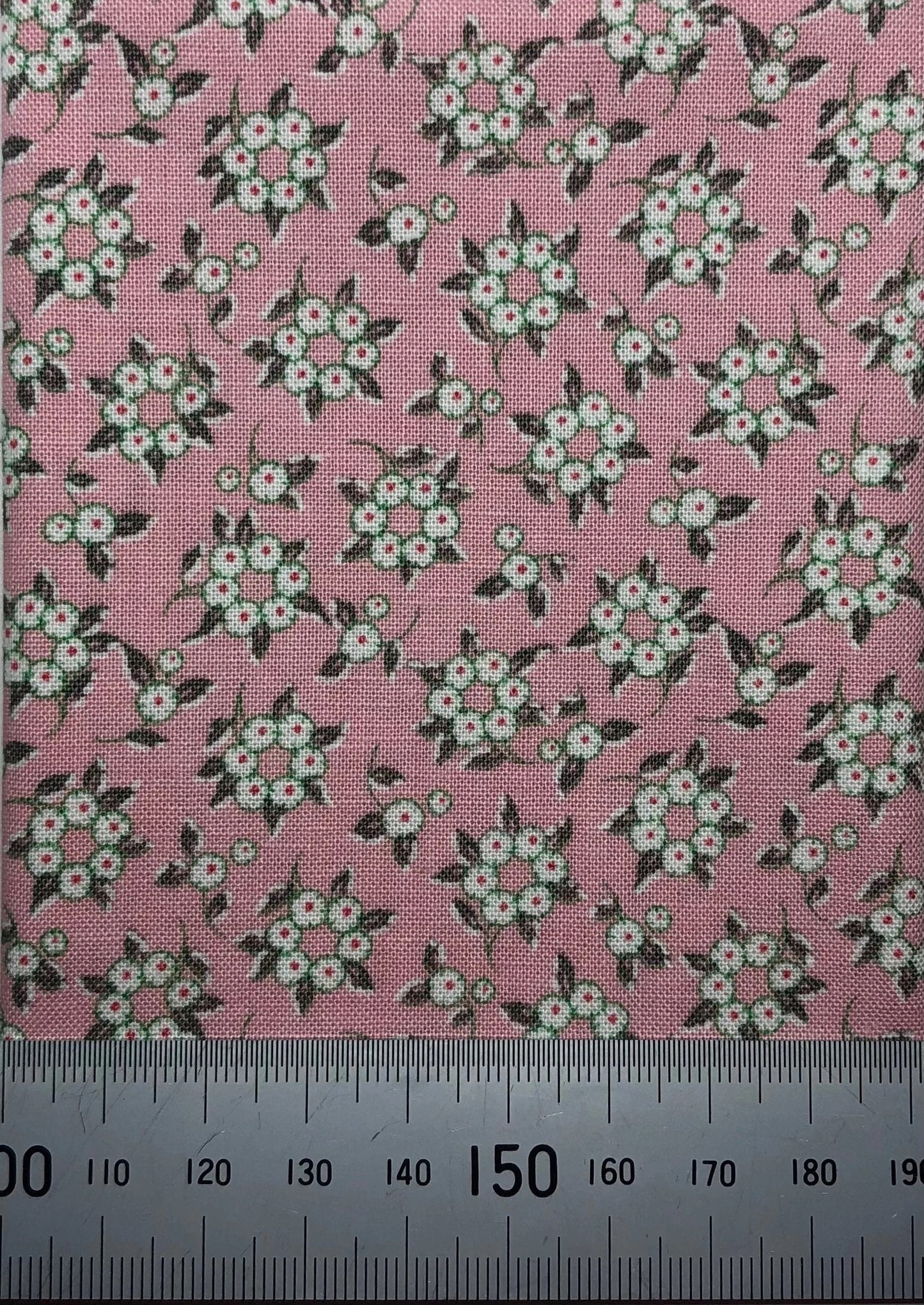 Floral hoops on a pink cotton
