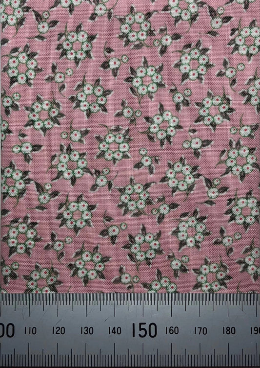 Floral hoops on a pink cotton