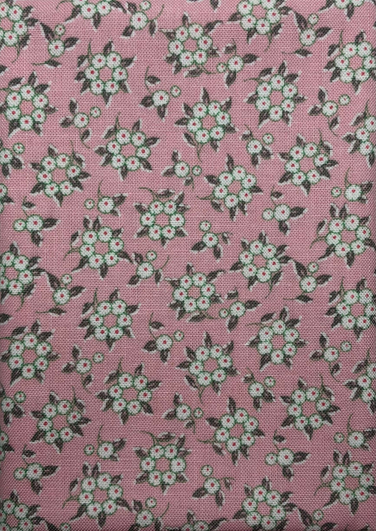 Floral hoops on a pink cotton