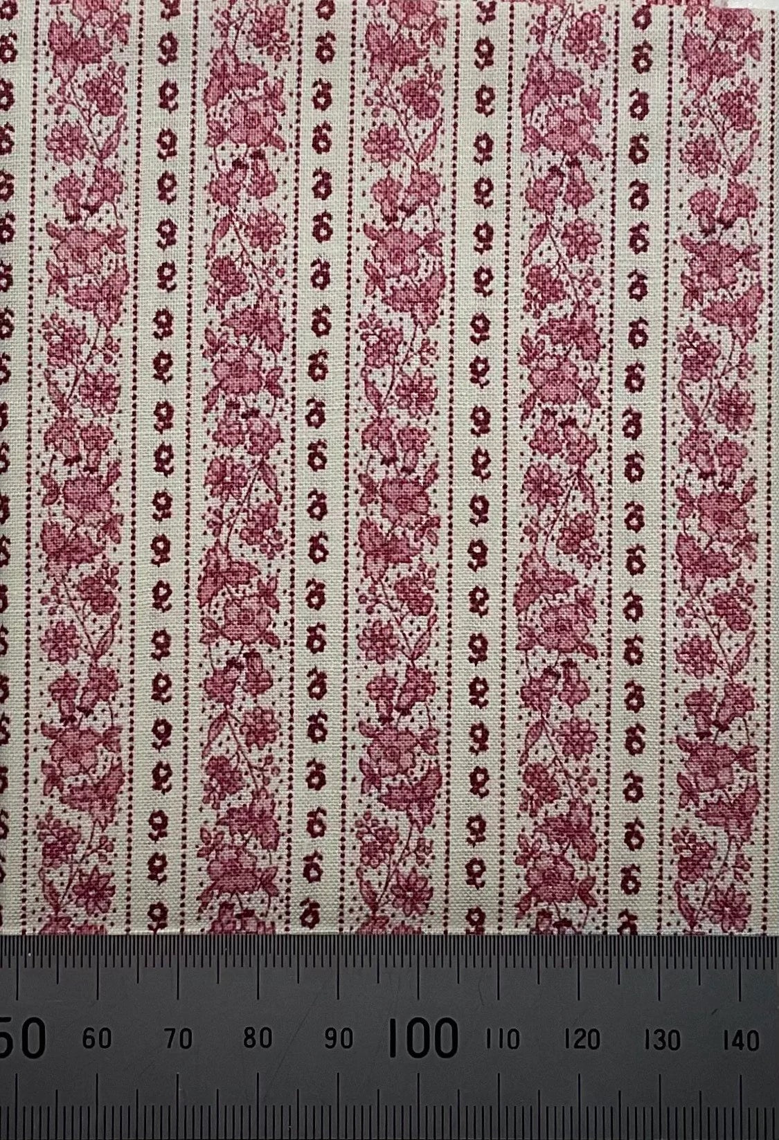 Red and cream floral stripe design