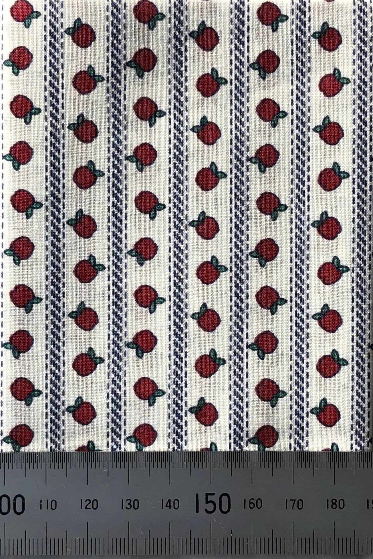 Apples on white cotton