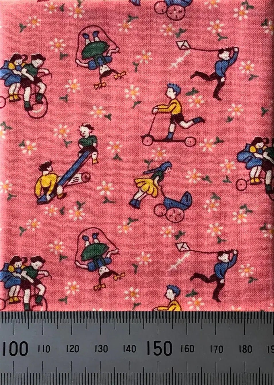 Children playing on pink cotton