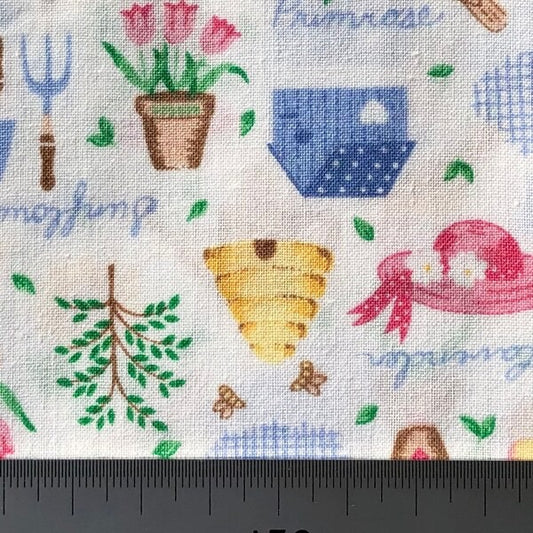 White cotton with garden items (Fat quarter)