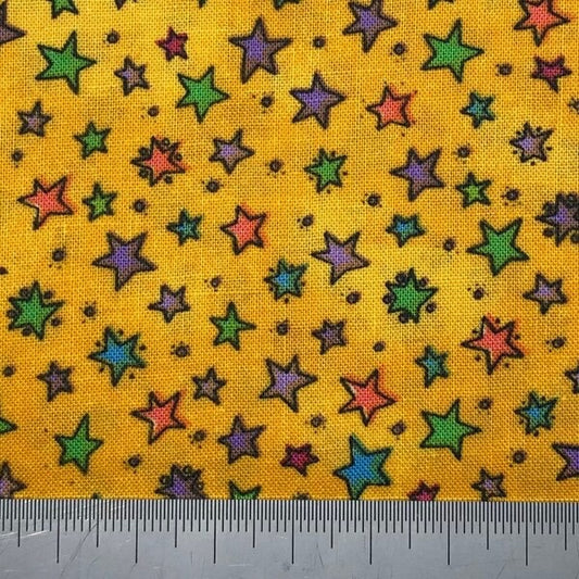 Multi coloured stars on a bright yellow cotton (Fat quarter)
