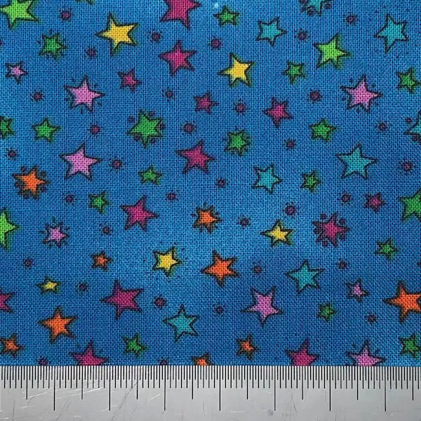 Multi coloured stars on a bright blue cotton (fat quarter)