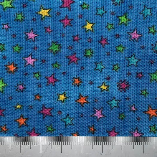 Multi coloured stars on a bright blue cotton (fat quarter)
