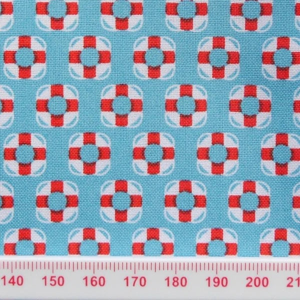 Life buoy print on blue cotton