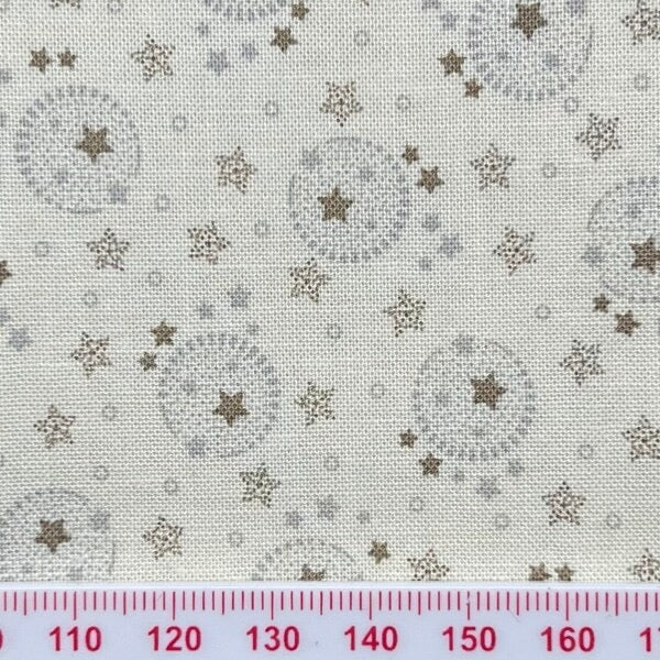 Moon and starts on cream cotton